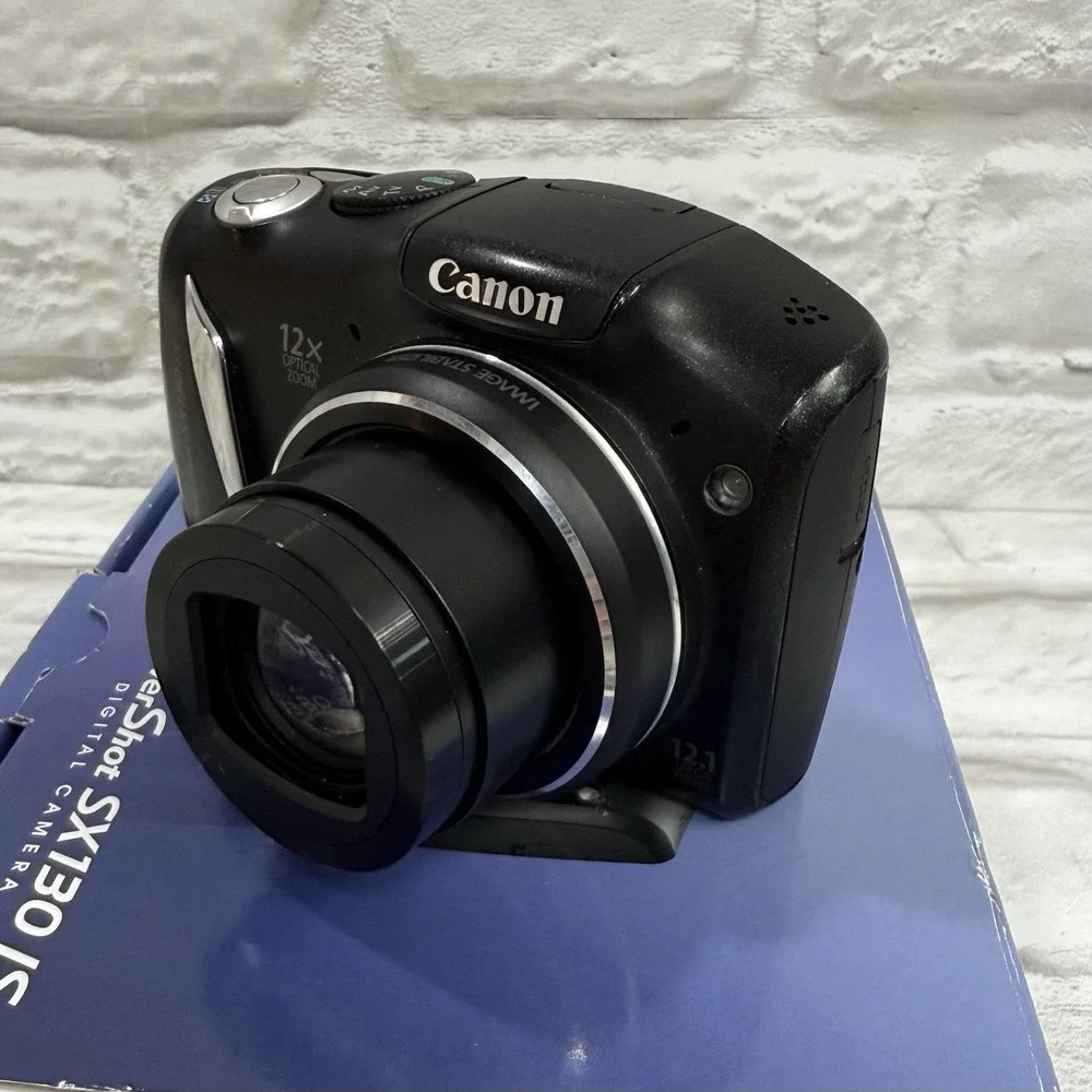 Canon SX130 IS Powershot Digital Camera 12x Optical Zoom 12.1 MP Black Excellent